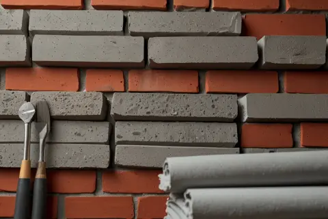 Jaka zaprawa do murowania komina? Poznaj najlepsze materiały do budowy trwałych i bezpiecznych kominów
